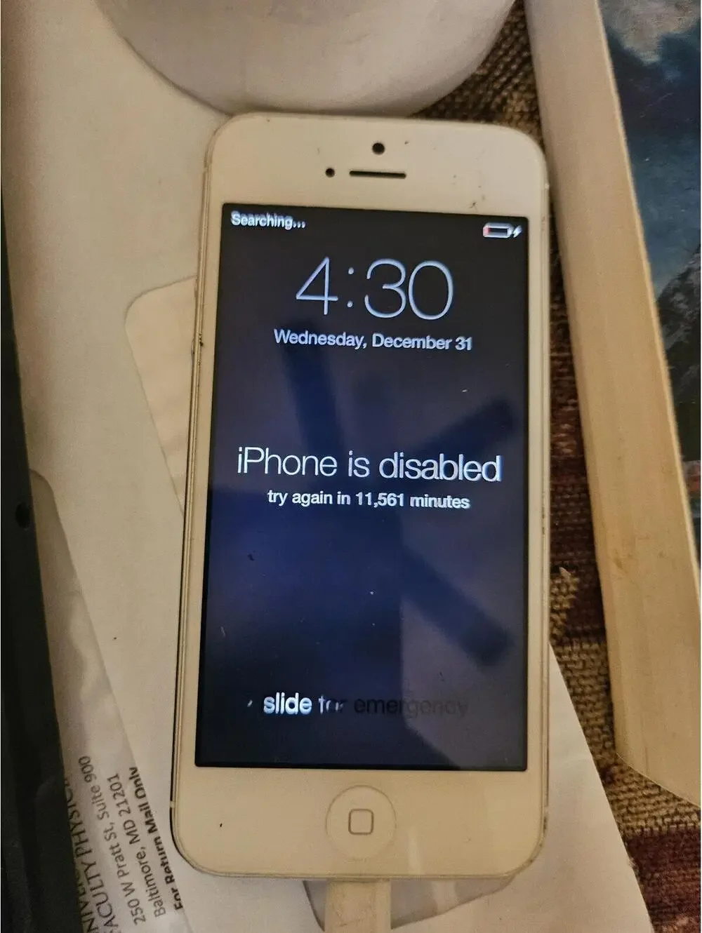 Apple iPhone 5 (i think) - White- charges and powers on. Working.